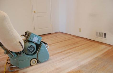 Hardwood Floor Sanding Machine Over Newly Sanded Floor